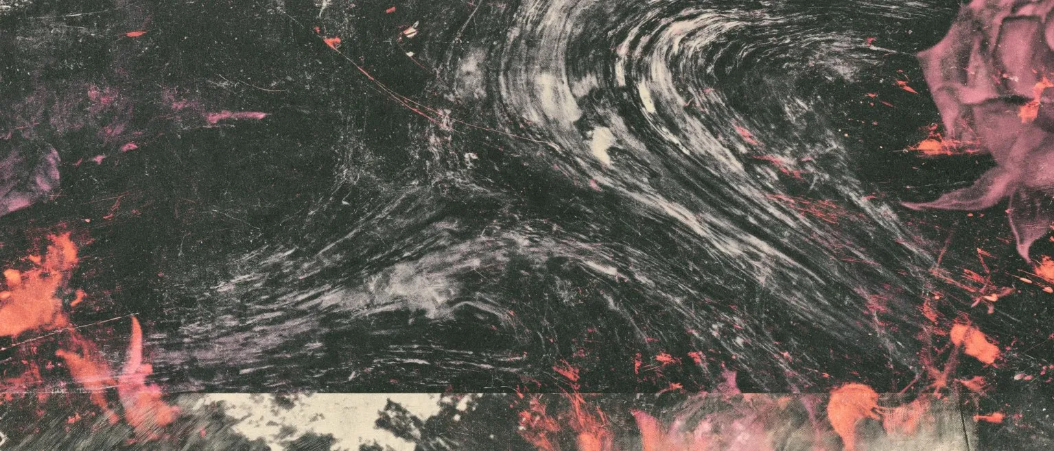 Swirled dark marbling with pink blooming at the edges.