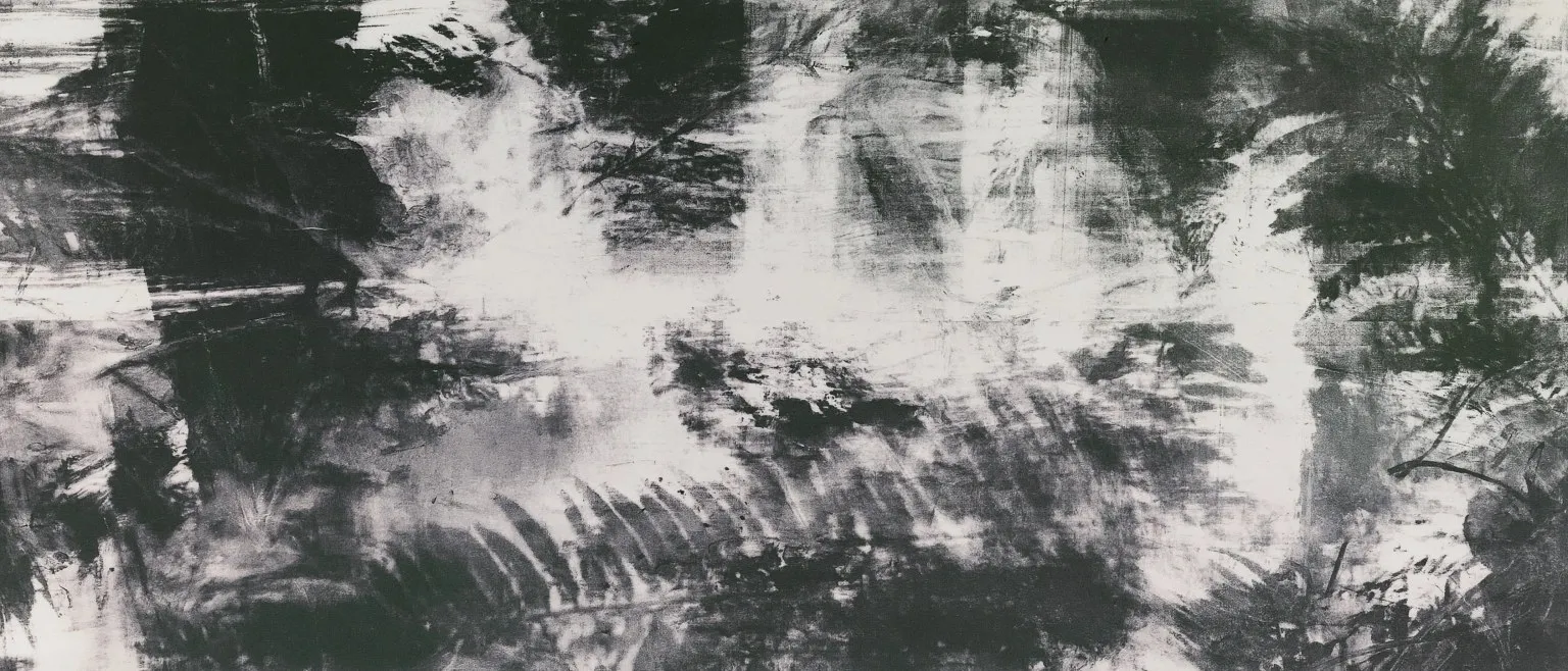 Ink scattered in a horizontal drift across pale ground.