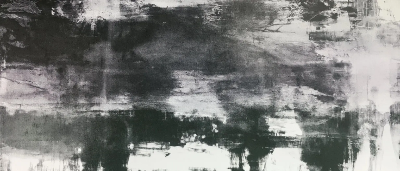 A wide soft grey field, faintly banded.