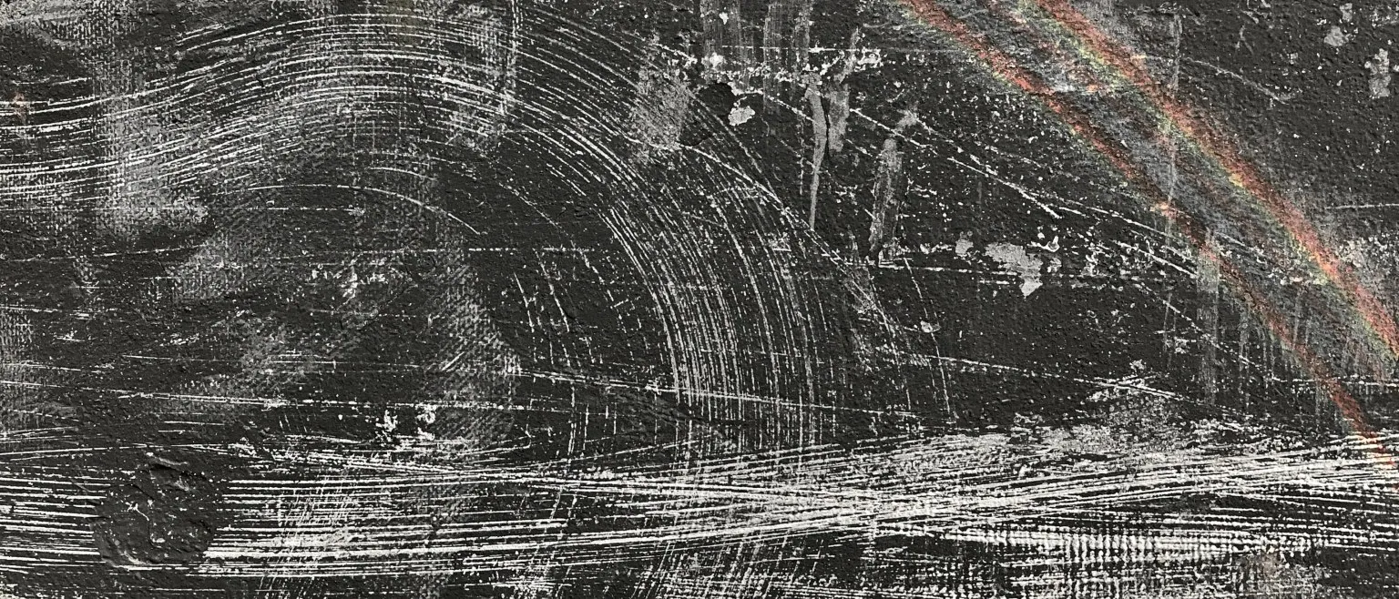 Sweeping white arcs combed across a black ground, a faint rainbow at the right.