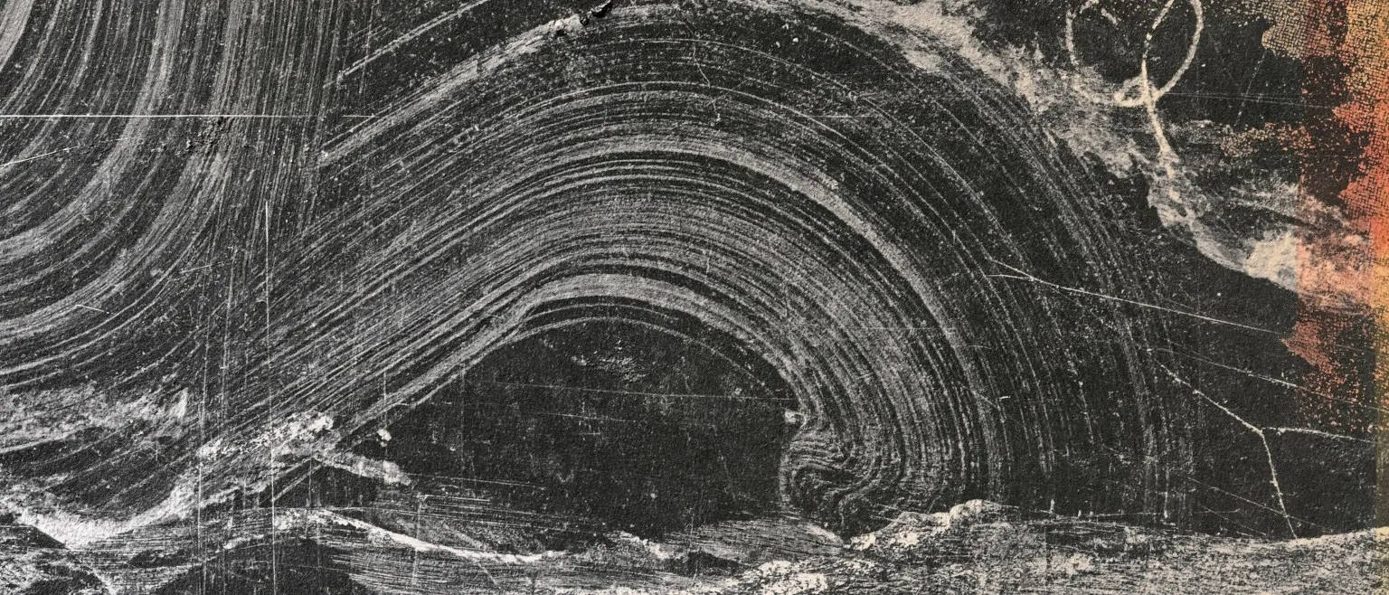 A white wave curling across a dark field, rust at the upper right.