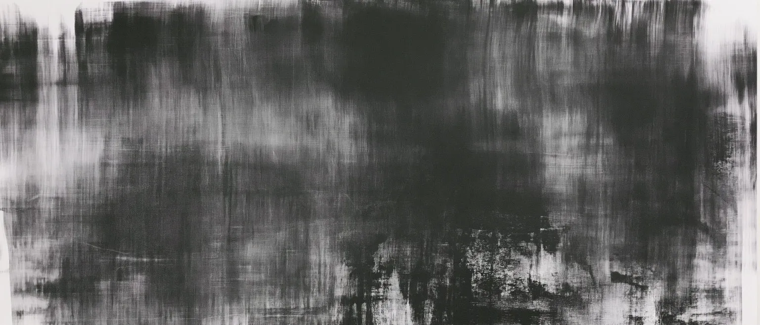 Broad dry-brushed strokes in dark grey, a black mass gathering at the centre thinning to pale at the edges.